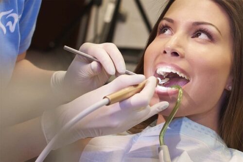Patient receiving dental treatment in Perfect Smile dental clinic Hungary image 