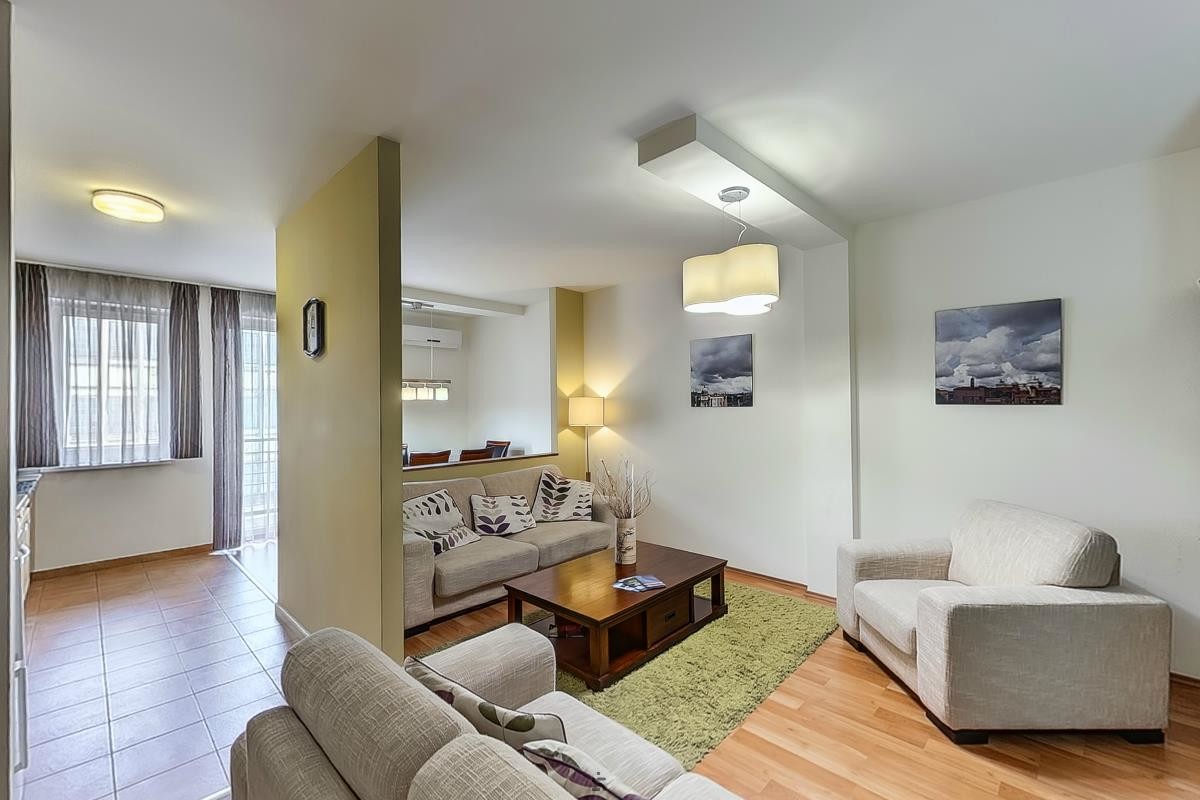 Comfortable living area in patient apartment accommodation for dental treatment in Hungary
