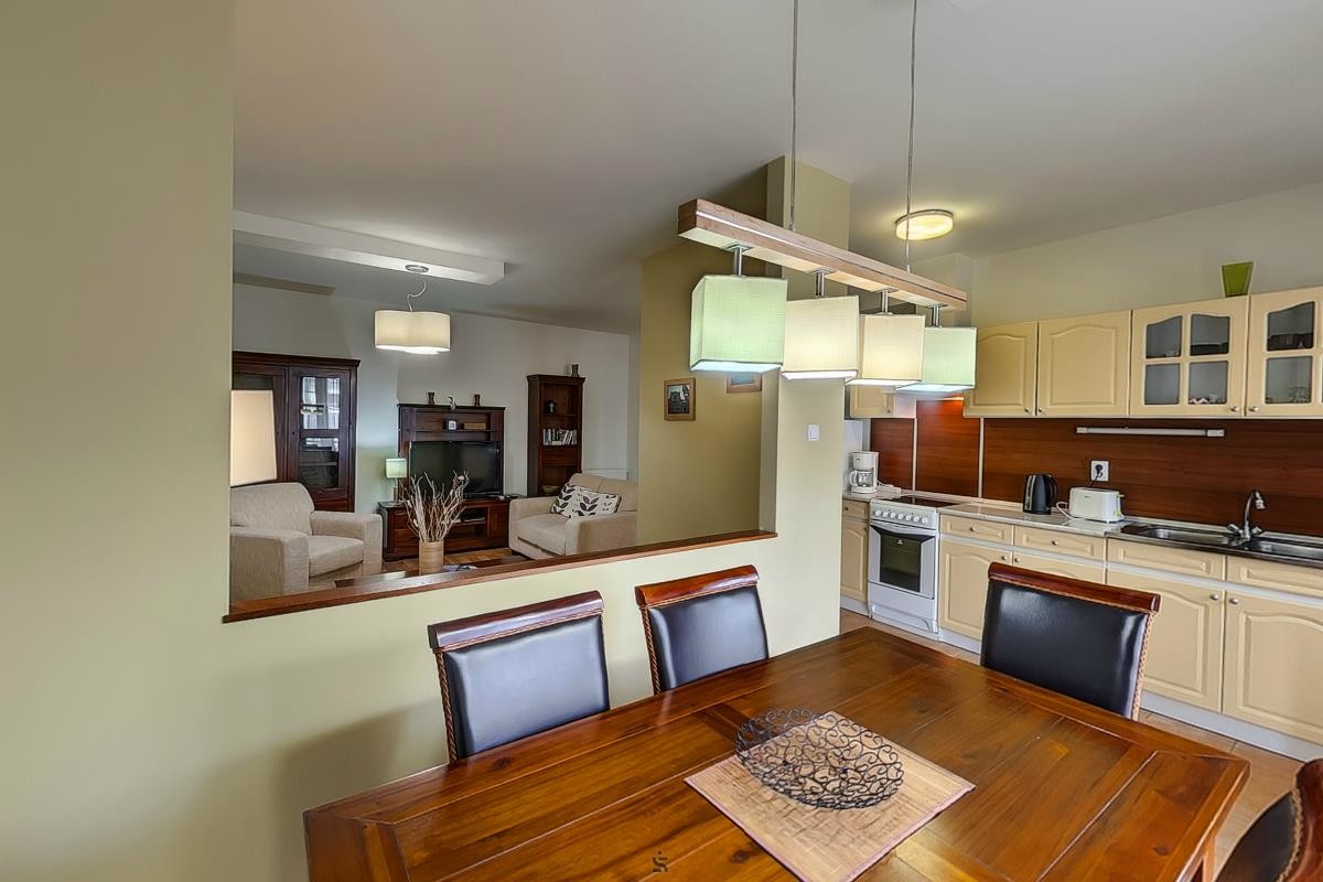 Kitchen and dining area in patient apartment accommodation near Perfect Smile Dental Implant Center Hungary